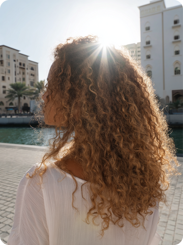 Protecting curly hair in summer: how, with what and why?